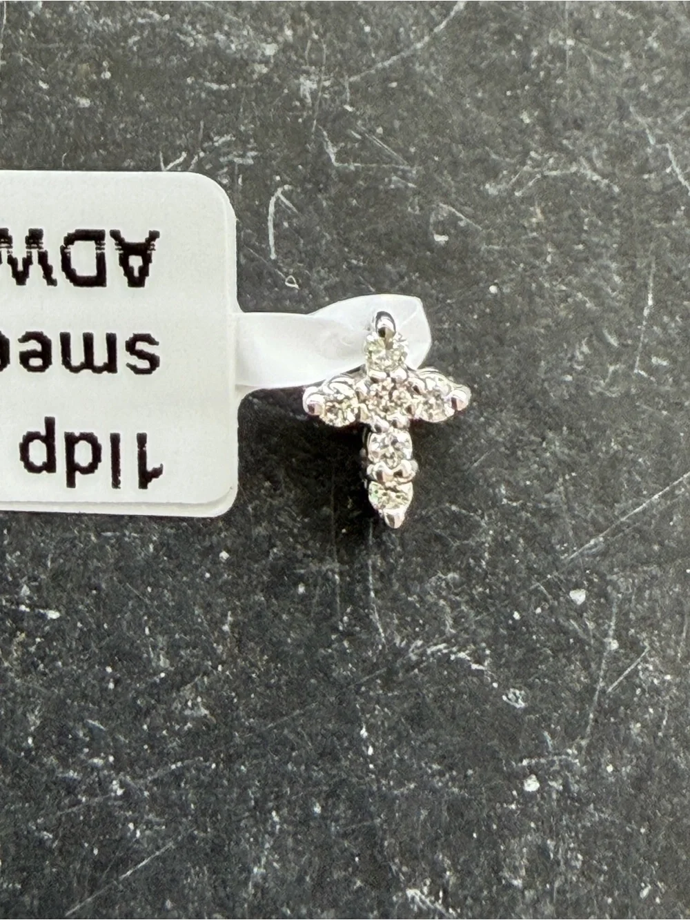 14kt white gold diamond cross .06 carats